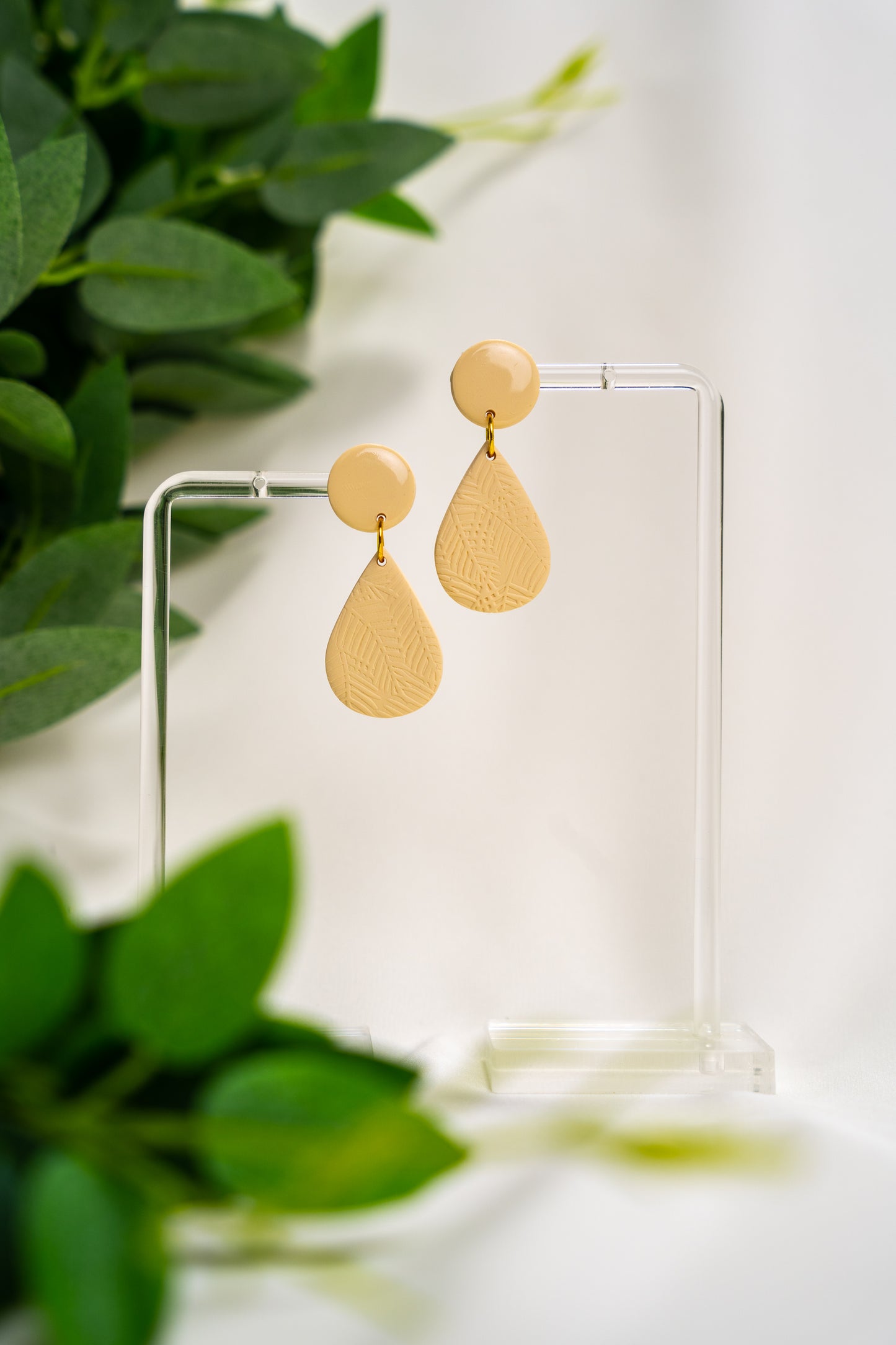 Light yellow embossed drop dangles