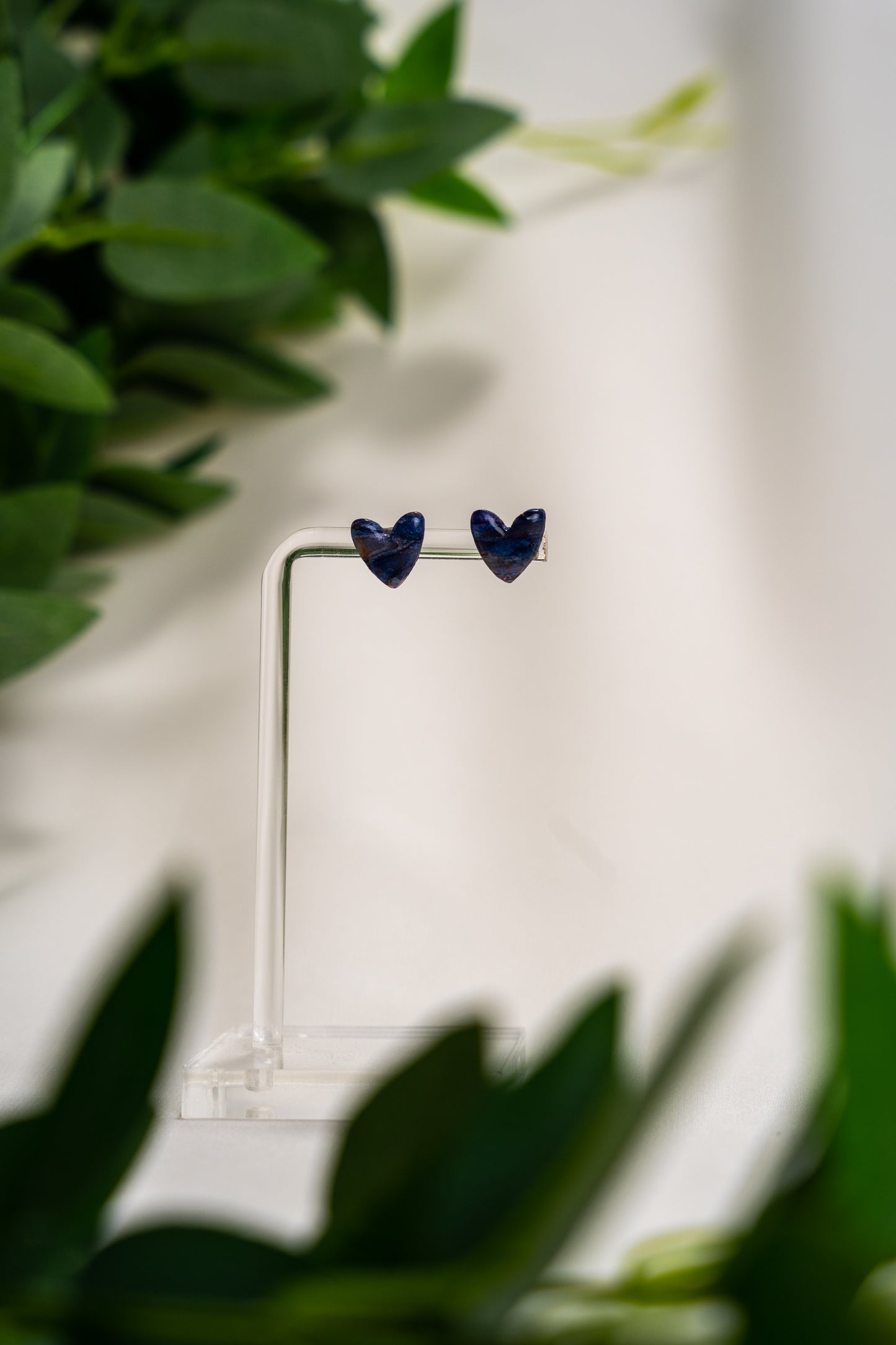 Blue marble heart studs