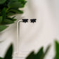 Black half flower studs