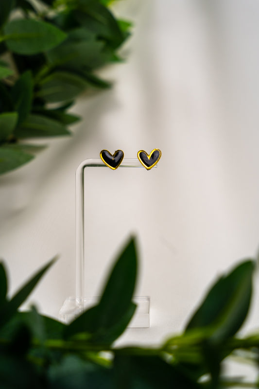 Black heart studs with gold outline