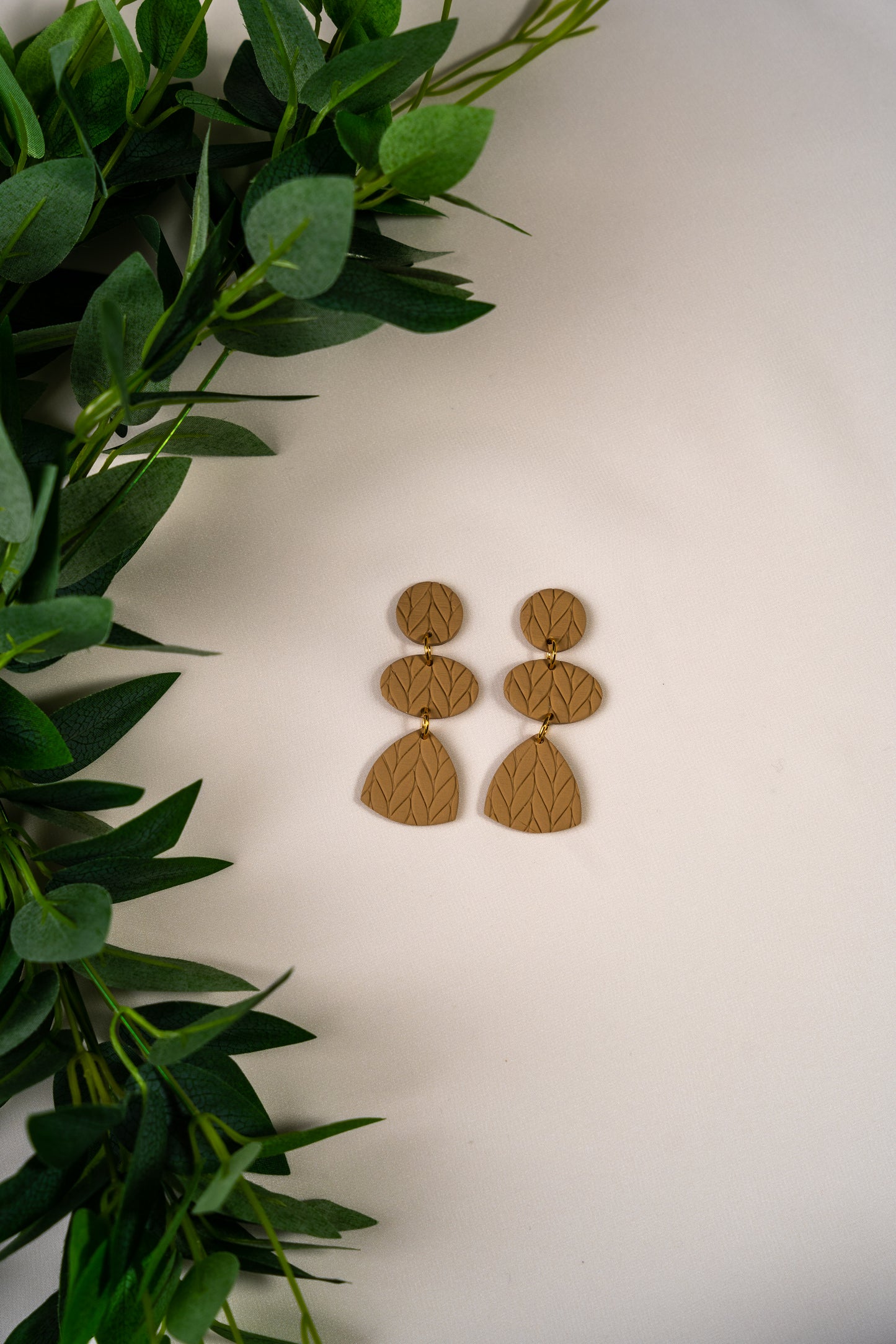 Beige knitted three piece dangles