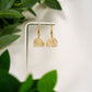 White marble arch top dangles